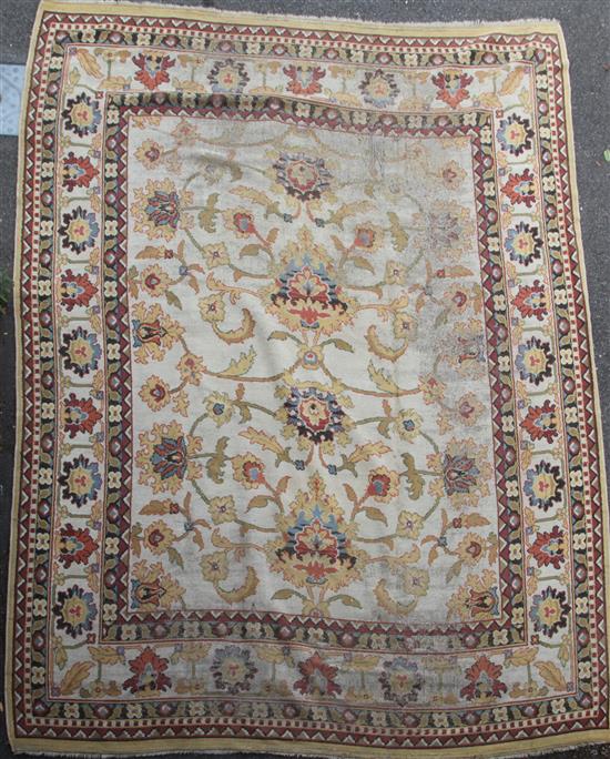 An Indian carpet of Ziegler style, 14ft 5in. x 11ft 2.5in. (badly worn)
